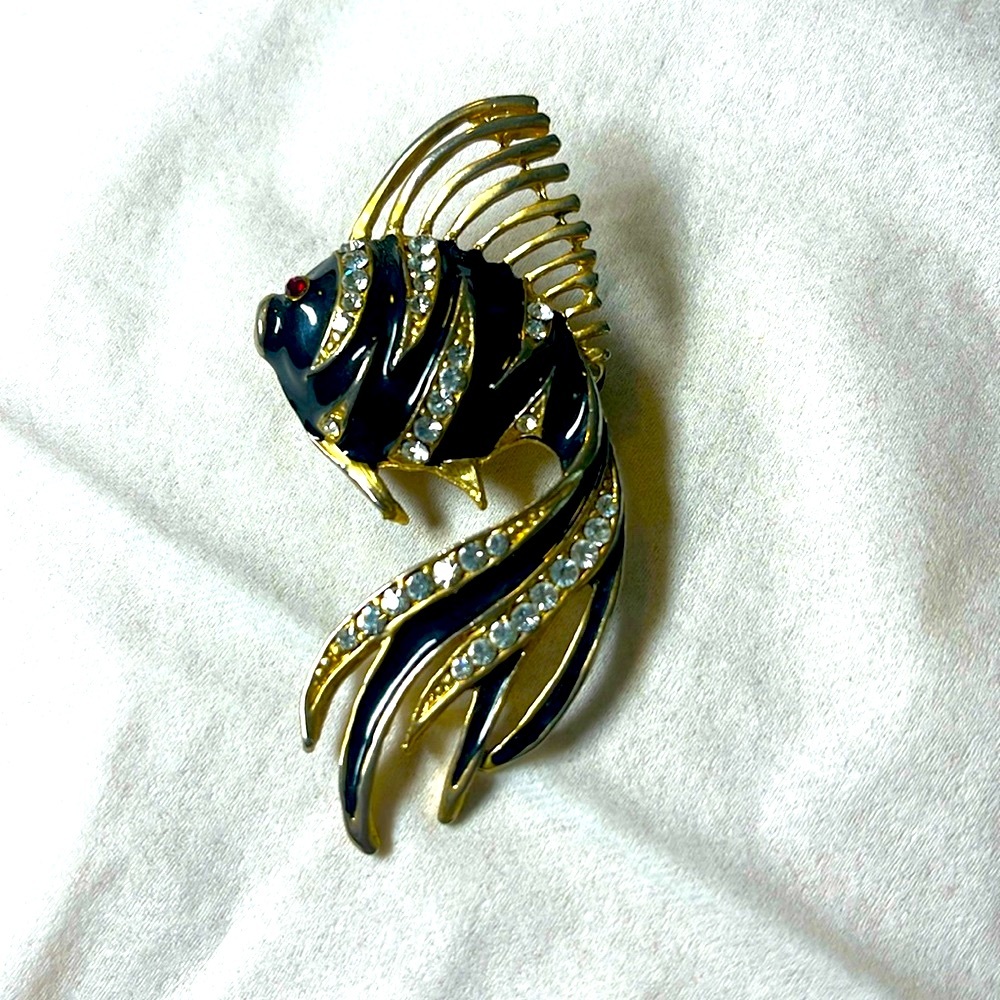 Fish brooches
